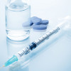 PrEP pills and injectable concept syringe