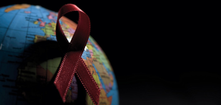 red ribbon on globe
