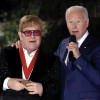Elton John (left) with President  Joe Biden