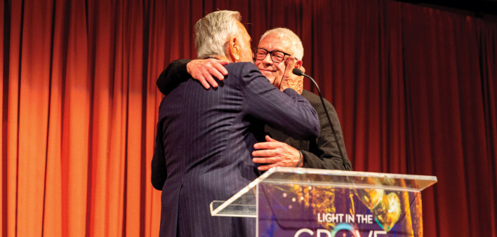 Cleve Jones (right) accepts a lifetime award from former San Francisco  Mayor Art Agnos.