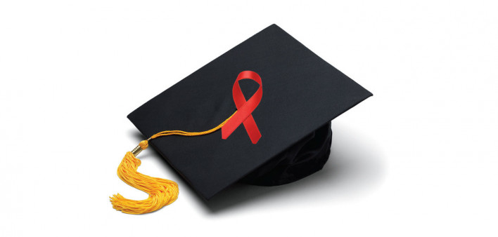 graduation cap and red ribbon