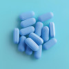 pile of blue pills PrEP Pre Exposure Prophylaxis