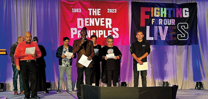 Denver HIV advocates and activists, including Calvin Lavan Gibson (holding the mic)