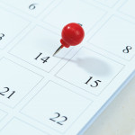 calendar with red pin on 14