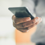 hand holding smart phone