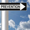 Ounce of Prevention sign against a blue sky